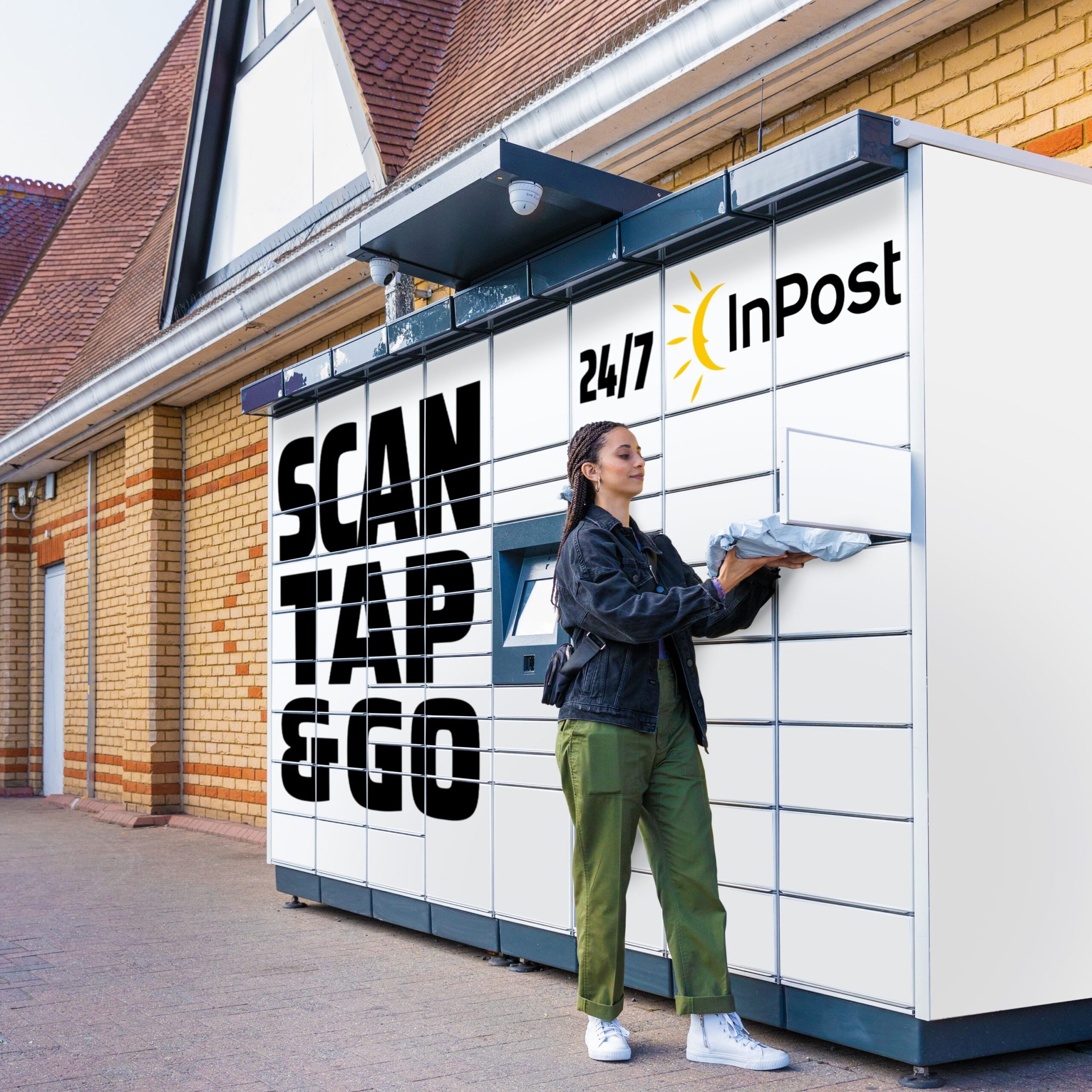 Lady putting parcel inside InPost parcel locker