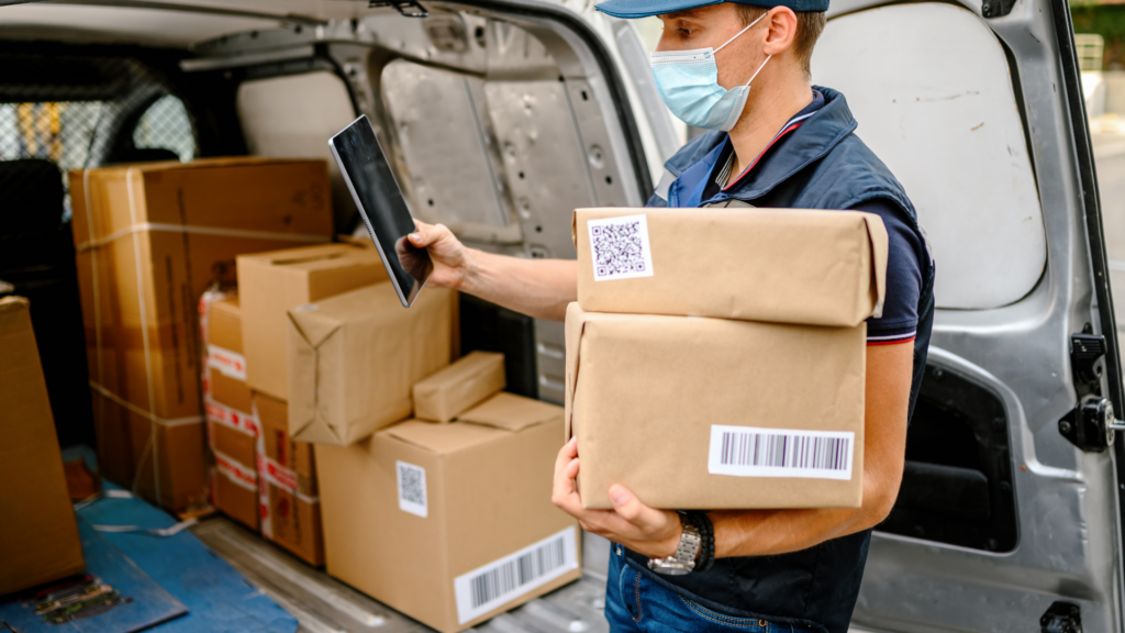 Courier Delivery Guy Scanning Packages with his Metafour Driver App
