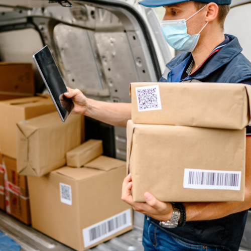 Courier Delivery Guy Scanning Packages with his Metafour Driver App